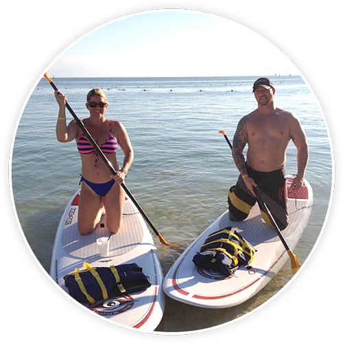 couple on paddleboards